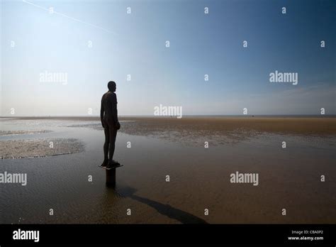 Antony Gormley Another Place sculptures Crosby Beach Stock Photo - Alamy