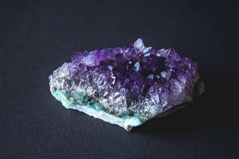 Purple amethyst crystal on a black background 3152741 Stock Photo at Vecteezy