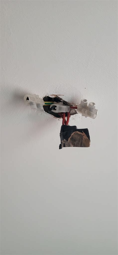 light fitting help please. I'm fitting a ceiling rose to these connectors. the black is ...