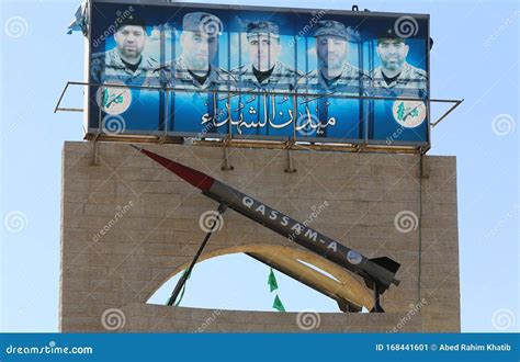 Palestinians Display a Large Qassam Rocket As a Monument Along with Images of Senior Leaders of ...