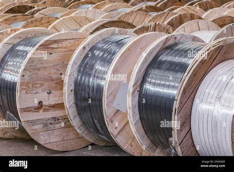 Large wooden spools with cable inside of the plant storage Stock Photo ...