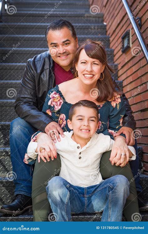 Mixed Race Young Family Portrait in the City Stock Image - Image of stairs, mother: 131780545