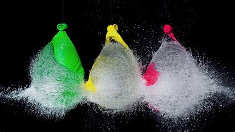 Water Balloons Popping in SLOW-MOTION - YouTube