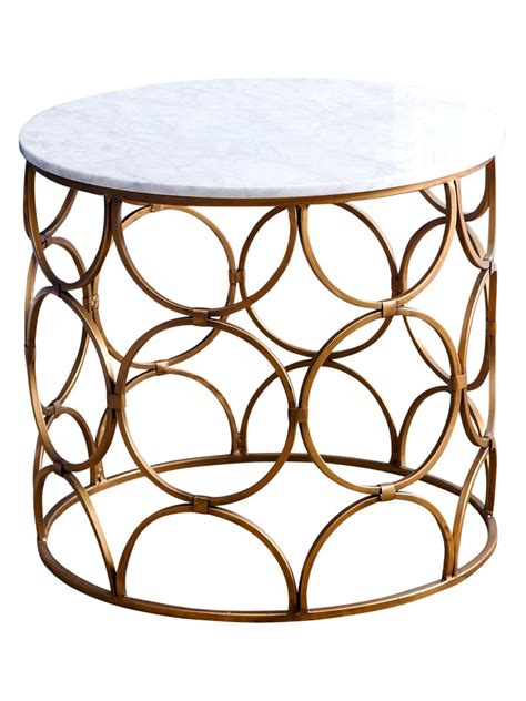 a white marble and gold metal coffee table