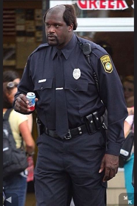 Shaquille O'Neal holding a regular sized can of soda. : pics