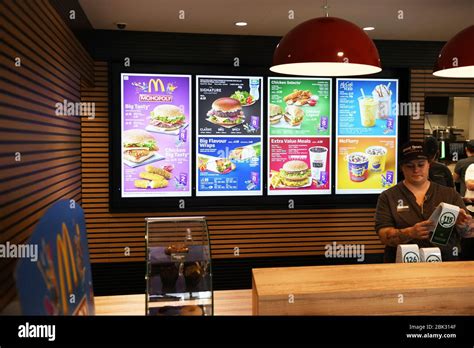 Colourful menu boards inside a McDonalds restaurant int he UK Stock Photo - Alamy