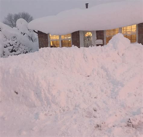 Photos: Record-breaking 60-inch snowfall blankets Erie, Pennsylvania ...