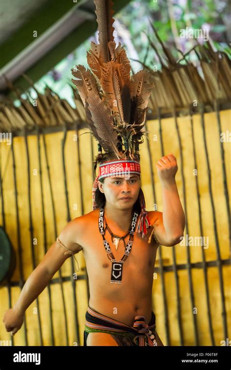 Portrait of a tourism worker wearing indigenous attire during an ...