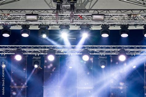 stage lighting equipment. spotlights on outdoor concert stage with ...