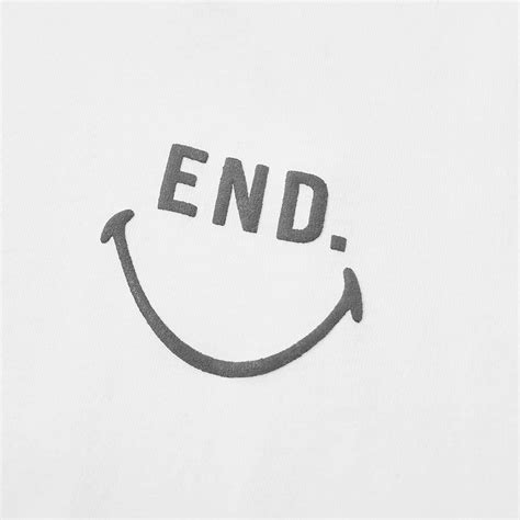 END. x Chinatown Market Smiley Face Tee END.