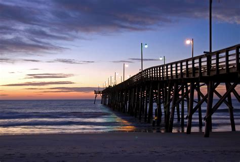 The Jolly Roger Pier at Topsail Beach North Carolina against the first light of the day ...