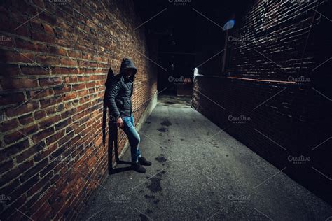 Suspicious man in dark alley ~ People Photos ~ Creative Market