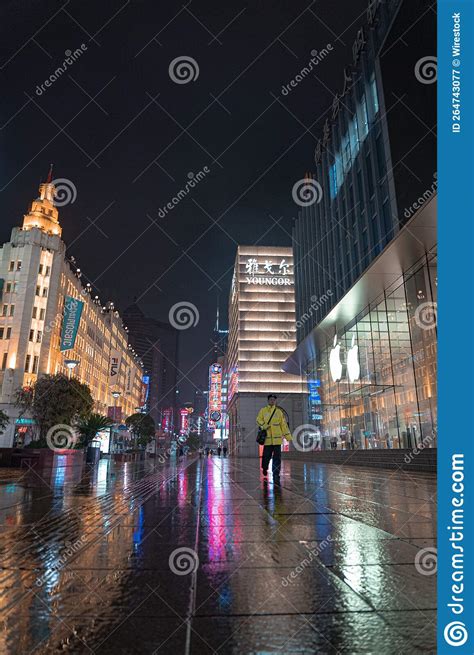 Wet Nanjing Road Pedestrian Street at Night with Illuminating Buildings Editorial Photography ...