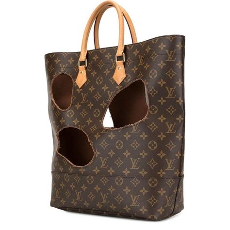 Style or senselessness? Would you buy this pre-owned Louis Vuitton handbag with giant holes in ...