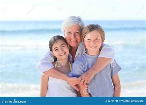 Grandmother with Her Grandchildren Stock Image - Image of little, people: 18701745