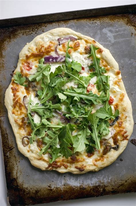 Goat Cheese Pizza with Arugula and White Sauce