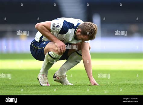 Tottenham Hotspur's Harry Kane appears in pain during the Premier ...