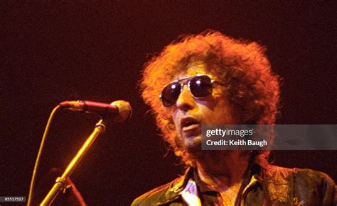 Photo of Bob DYLAN, Bob Dylan performing on stage, sunglasses News Photo - Getty Images