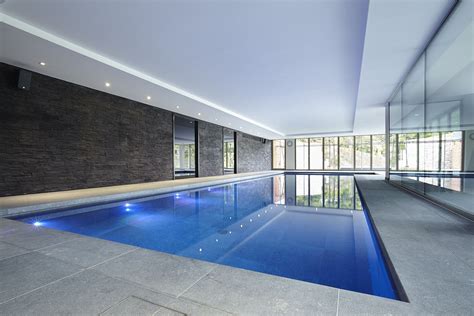 Luxury indoor swimming pool with bespoke lighting | Indoor swimming ...