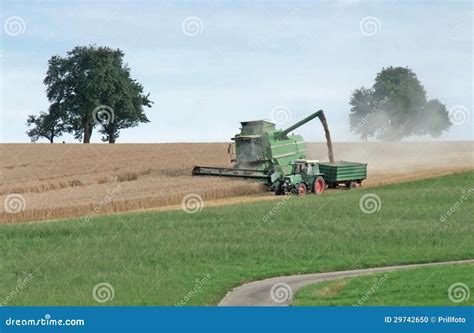 Harvesting Harvester on a Crop Field Stock Photo - Image of efficiency, engineering: 29742650