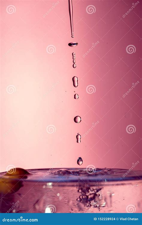 Water Splash Isolated on Red Background Stock Photo - Image of macro ...