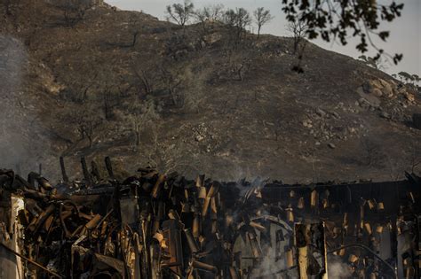 Authorities on alert as winter storm moves toward charred mountains in ...