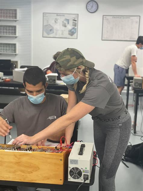 Our aircraft mechanic students working on an Ohm Board, learning how to calculate resistance ...