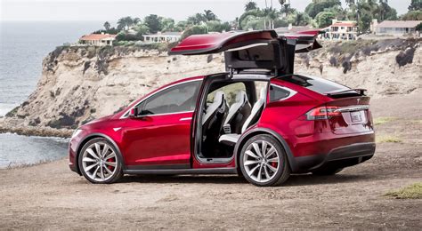 Tesla Model X falcon wing doors use ultrasonic sensors to operate in tight spaces - photos ...
