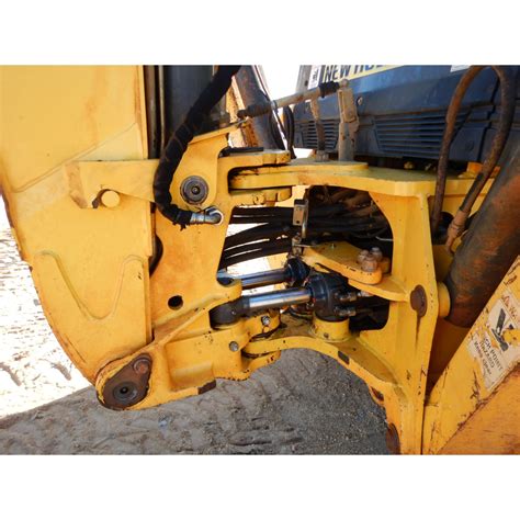 2012 NEW HOLLAND B95C Backhoe - J.M. Wood Auction Company, Inc.