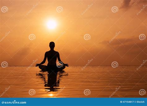 Woman Practicing Yoga, Silhouette on the Beach at Sunset Stock Image - Image of peace, balance ...