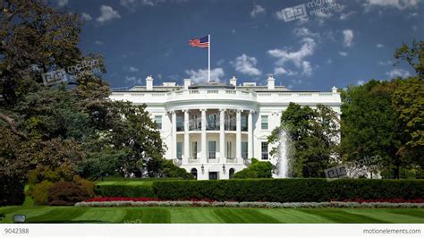 White House With Background Clouds In Timelapse USA Flag Waving Stock ...