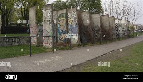 Grey sky view Berlin Wall graffiti segments, removed 1997 World War 2 ...