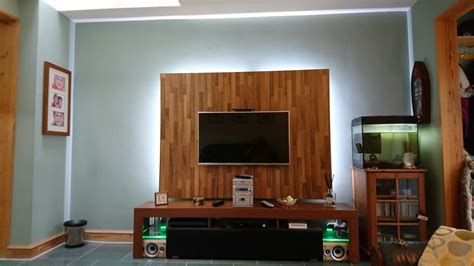 Our new light walnut TV back panel. Hooks on and off the wall with the ...