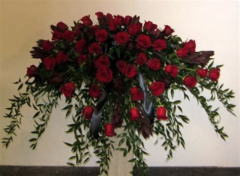 Red rose casket spray in Atlanta, GA | Flowering Events