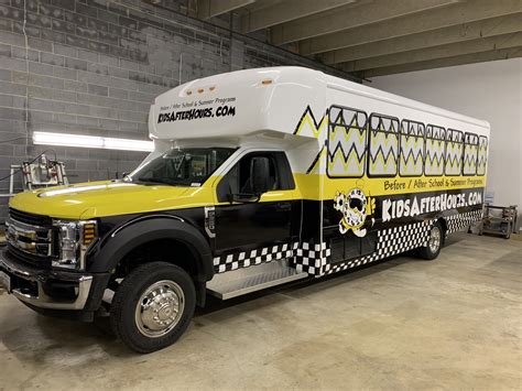 Bus Graphics Wraps - RoadRunner Vehicle Wraps