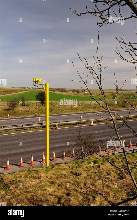 Average speed cameras at roadworks on the M4 motorway Stock Photo - Alamy