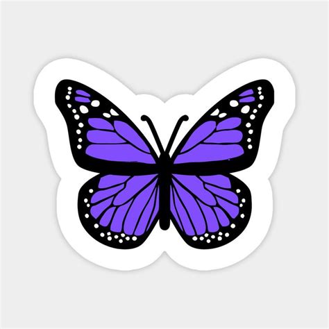 a purple butterfly with white dots on it's wings