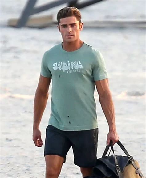 Zac Efron shows off bulging biceps as filming for Baywatch remake ...