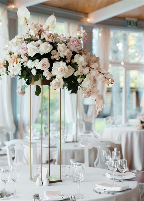 29 Tall Centerpieces That Will Take Your Reception Tables to New Heights | Tall wedding ...