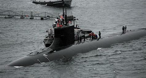 US Seawolf class submarines are bigger and faster and can deploy Navy SEALS and tap undersea ...