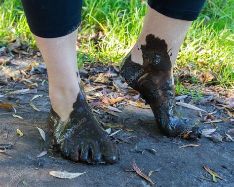 Feet in mud close-up Stock Photo by ©michaklootwijk 40347365