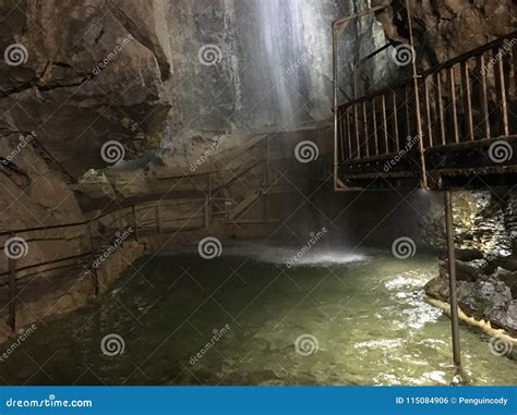 Waterfall in cave stock photo. Image of walk, caves - 115084906