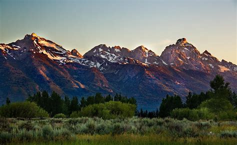 Sunrise on The Grand Tetons Photograph by Russ Harris