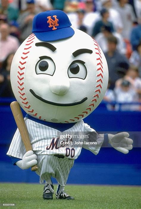 New York Mets mascot Mr. Met holding bat during game vs San Francisco ...