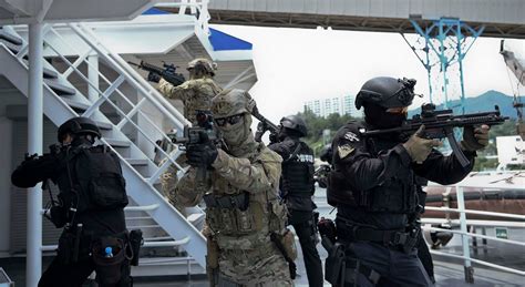 South Korean Navy UDT/SEALs Military Police and Coast Guard SSAT conducting antiterrorism drill ...