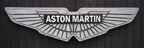 Bonhams Cars : An 'Aston Martin' garage display emblem,