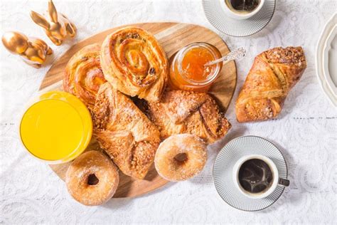 Breakfast with Different French Pastries, Juice and Jam Stock Photo - Image of chocolate, danish ...