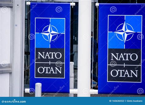 NATO Logo, During NATO SUMMIT 2018 Editorial Image | CartoonDealer.com #121128586