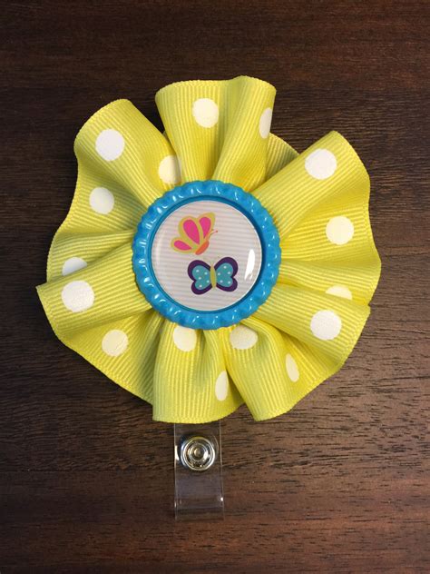 Name badge clip with yellow flower & embellishment | Etsy