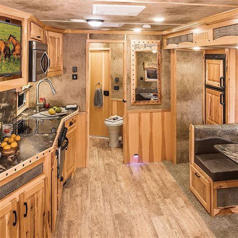 Loving the color scheme in this Lakota Bighorn with 14' living quarters… | Horse trailer living ...